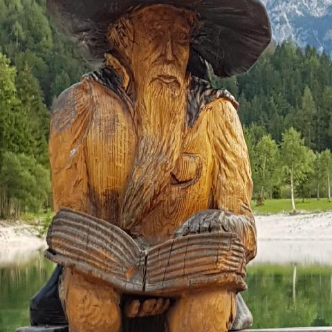 Wooden figure by Lake Jasna Kranjska Gora - Slovenia